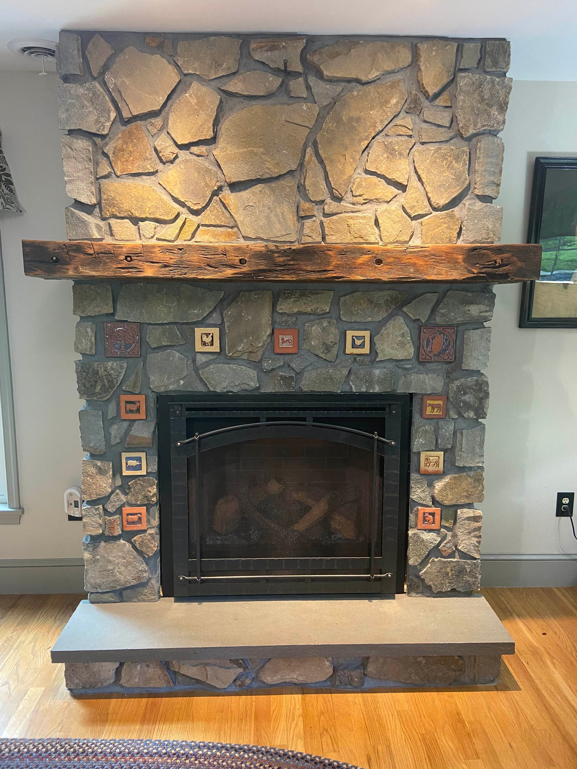 Blue stone patio, half cleaned, next to a white house door and red brick pathway.
