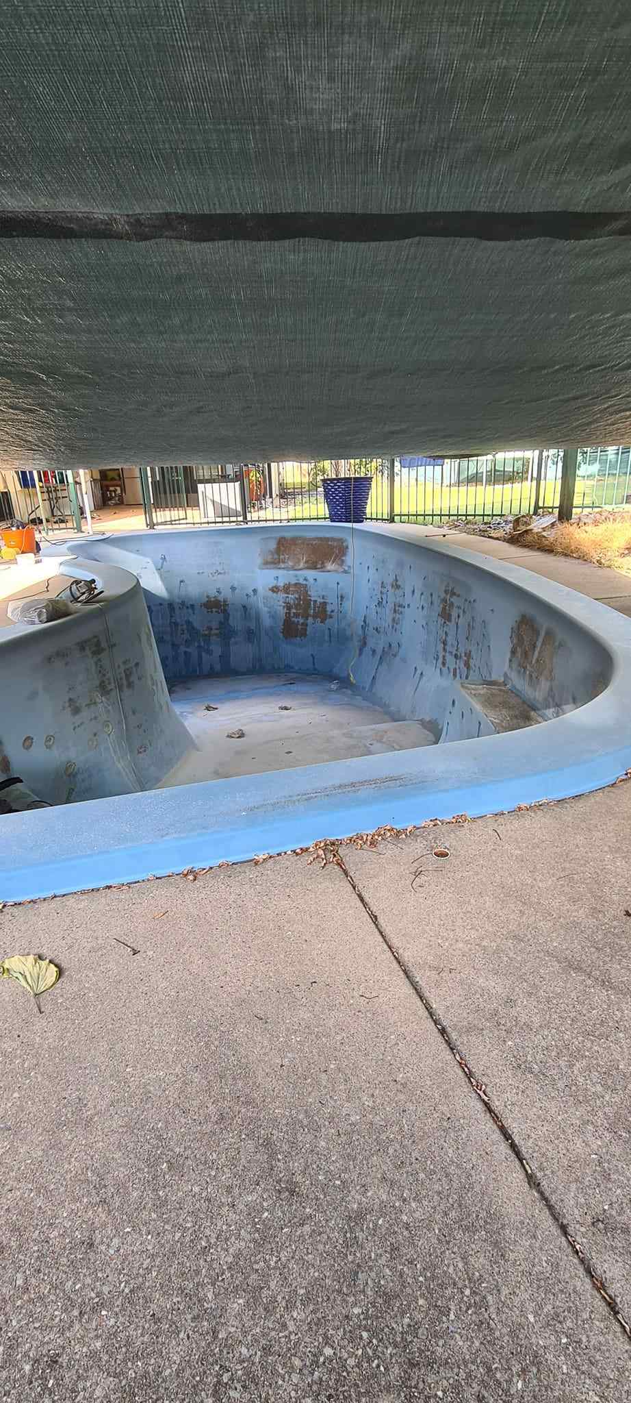 Before Kidney Shape Pool Renovation — Quality Pool Resurfacing in Darwin, NT