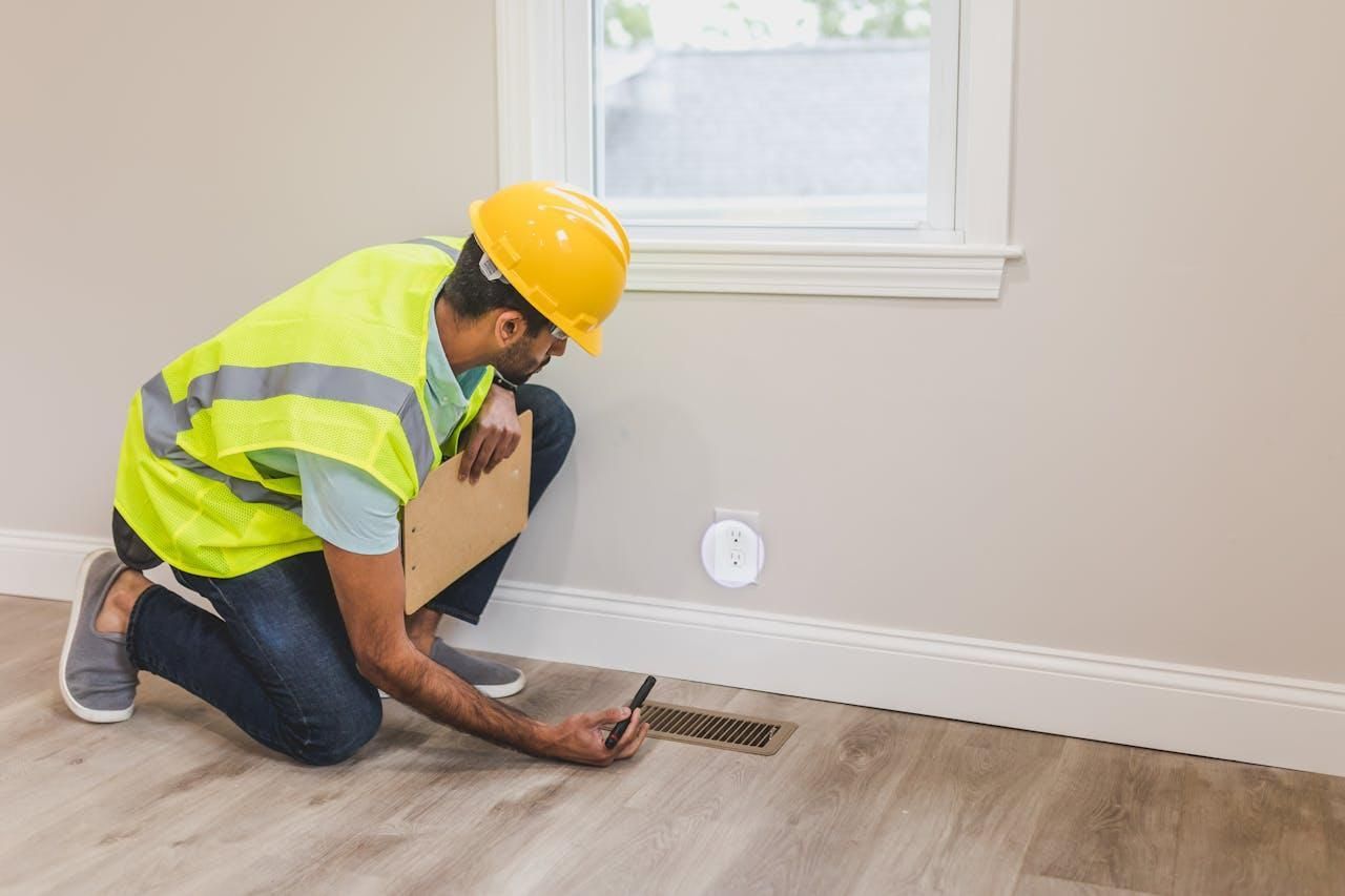Home inspector checking an electrical socket