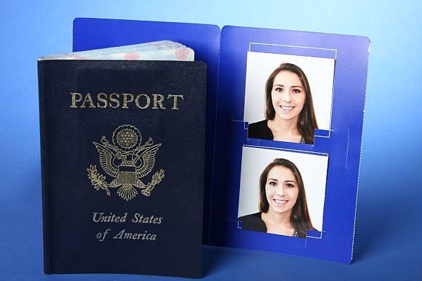A United States of America passport with two pictures of a woman on it. - Port Saint John, FL - Shipping Depot of Port St John