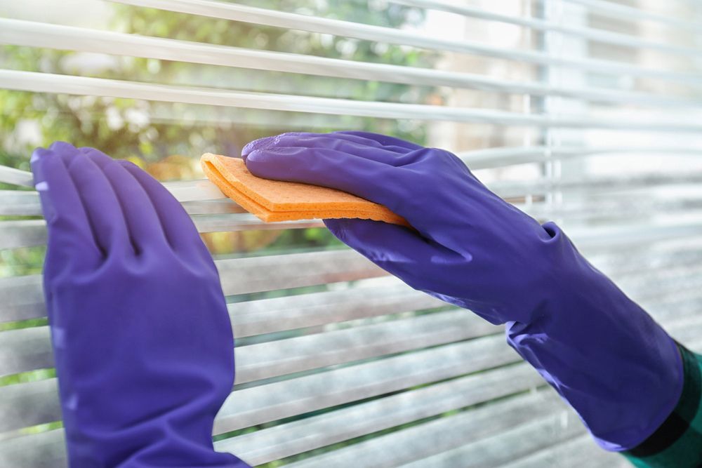 Cleaning A Window Blinds