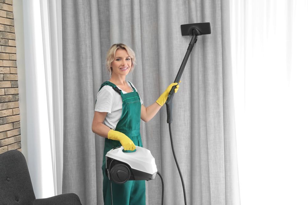Woman Cleaning A Curtain — Shade Fresh in Bennetts Green, NSW