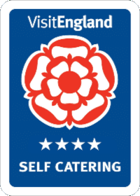 VisitEngland logo featuring a red Tudor rose above four stars and the text 