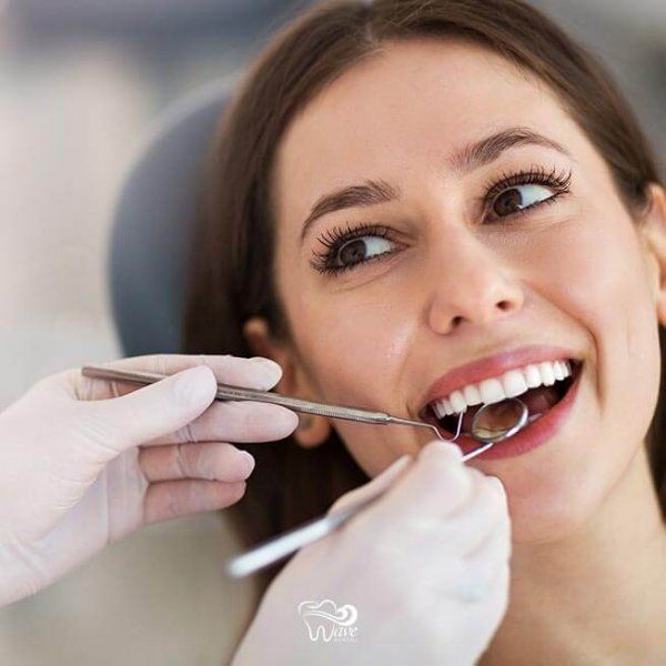 Woman Smiling at Dentist | Best Dentist for Teeth Whitening and Cleaning | Houston TX 77042