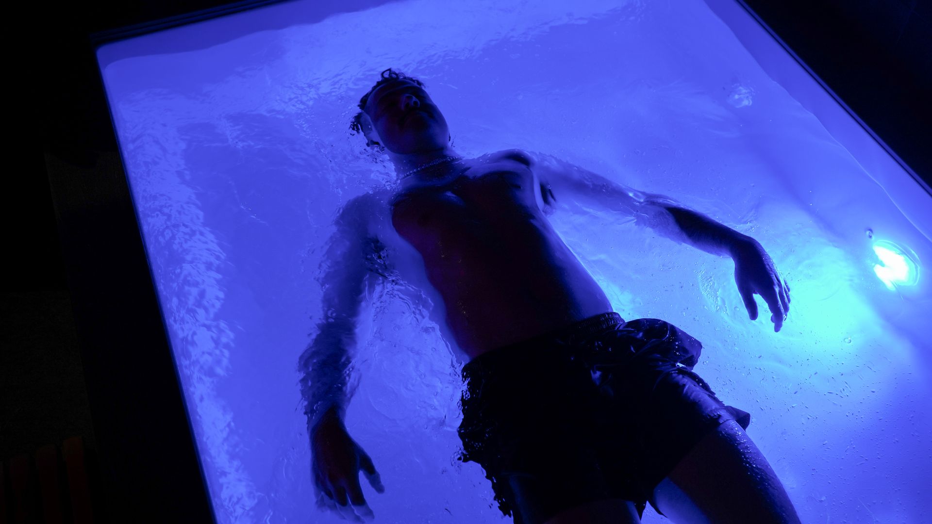 placeholder image of woman in a float tank