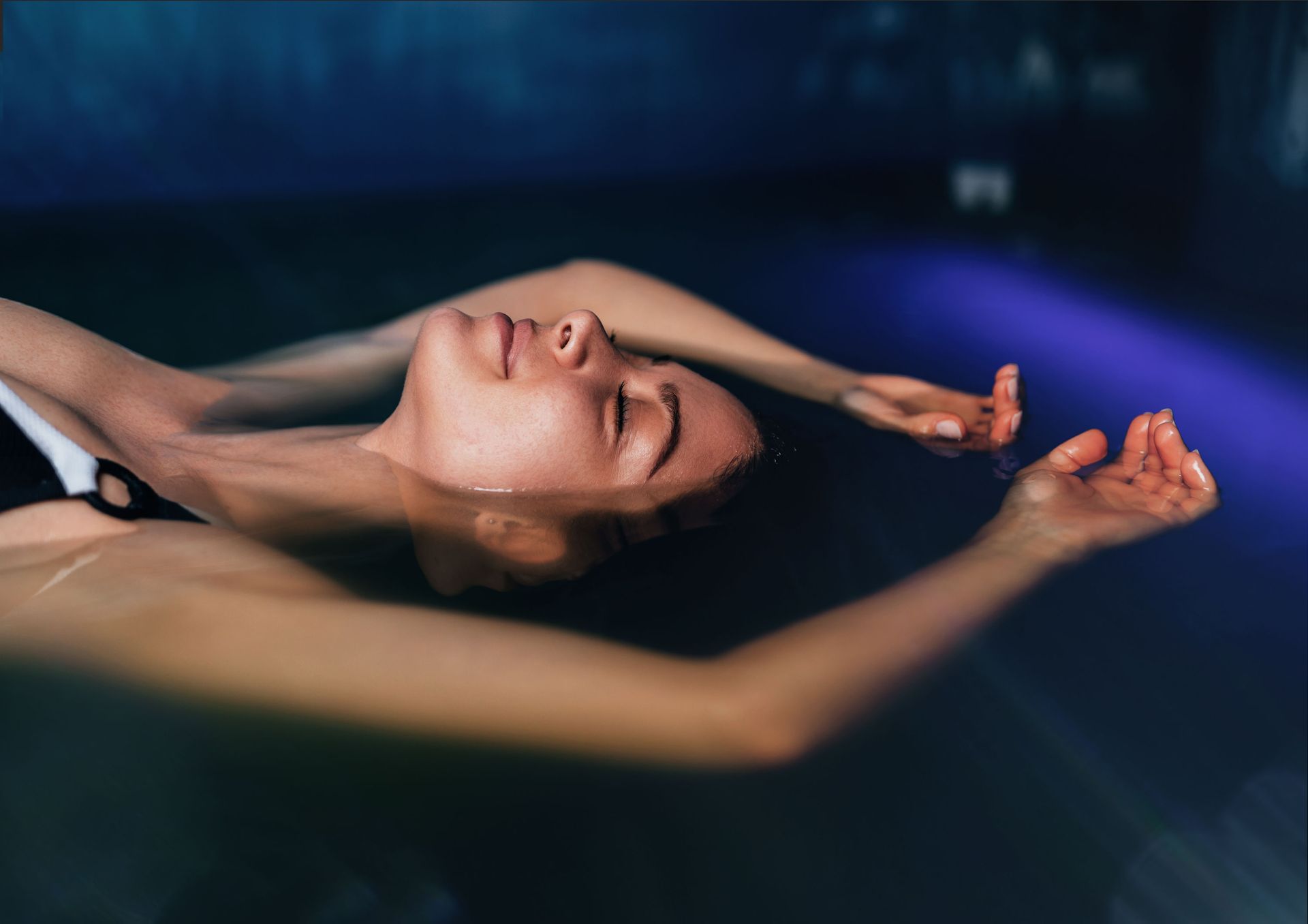 placeholder image of woman in a float tank