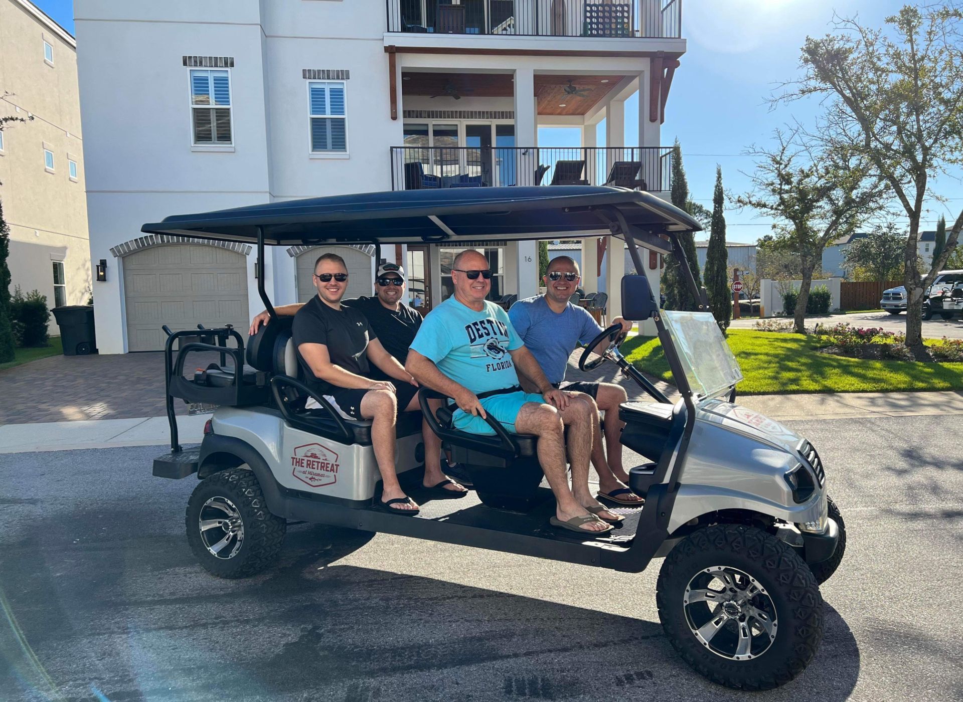 Men Riding in Golf Cart