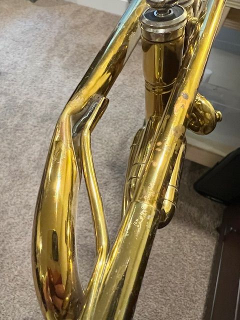 Crushed crook on trumpet bell