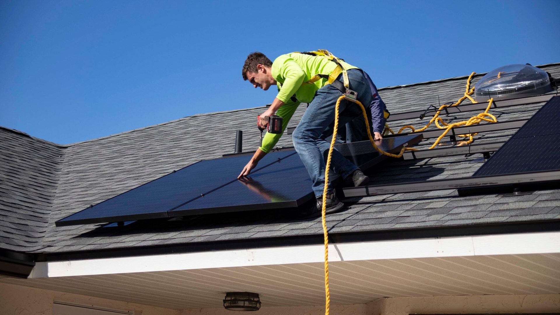 solar installer on a roof