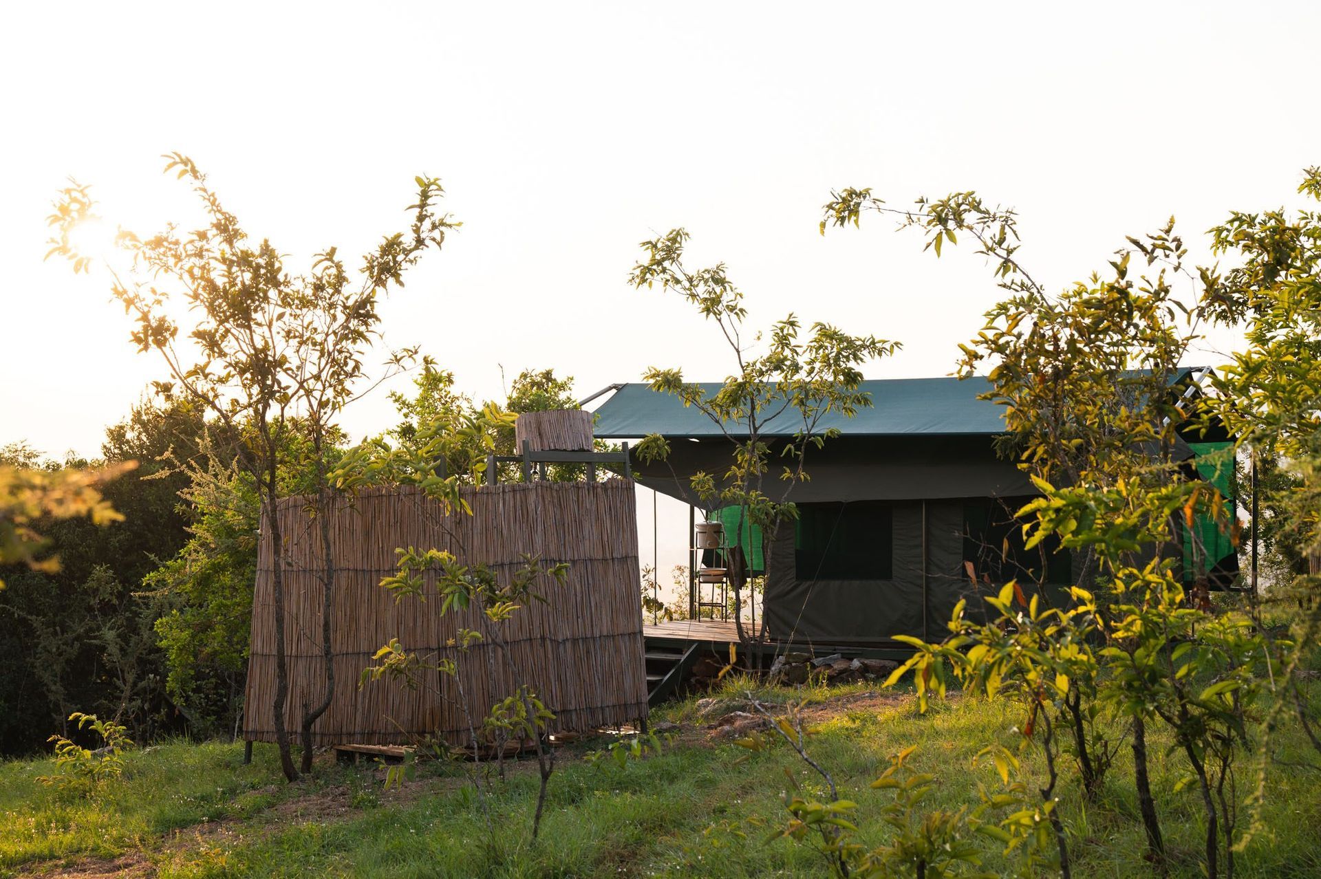 the rustic karenge bush camp with outside bathroom