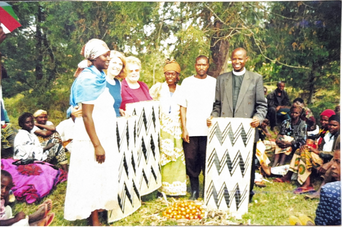 Village of Hope members Celebrating Sitting on grass