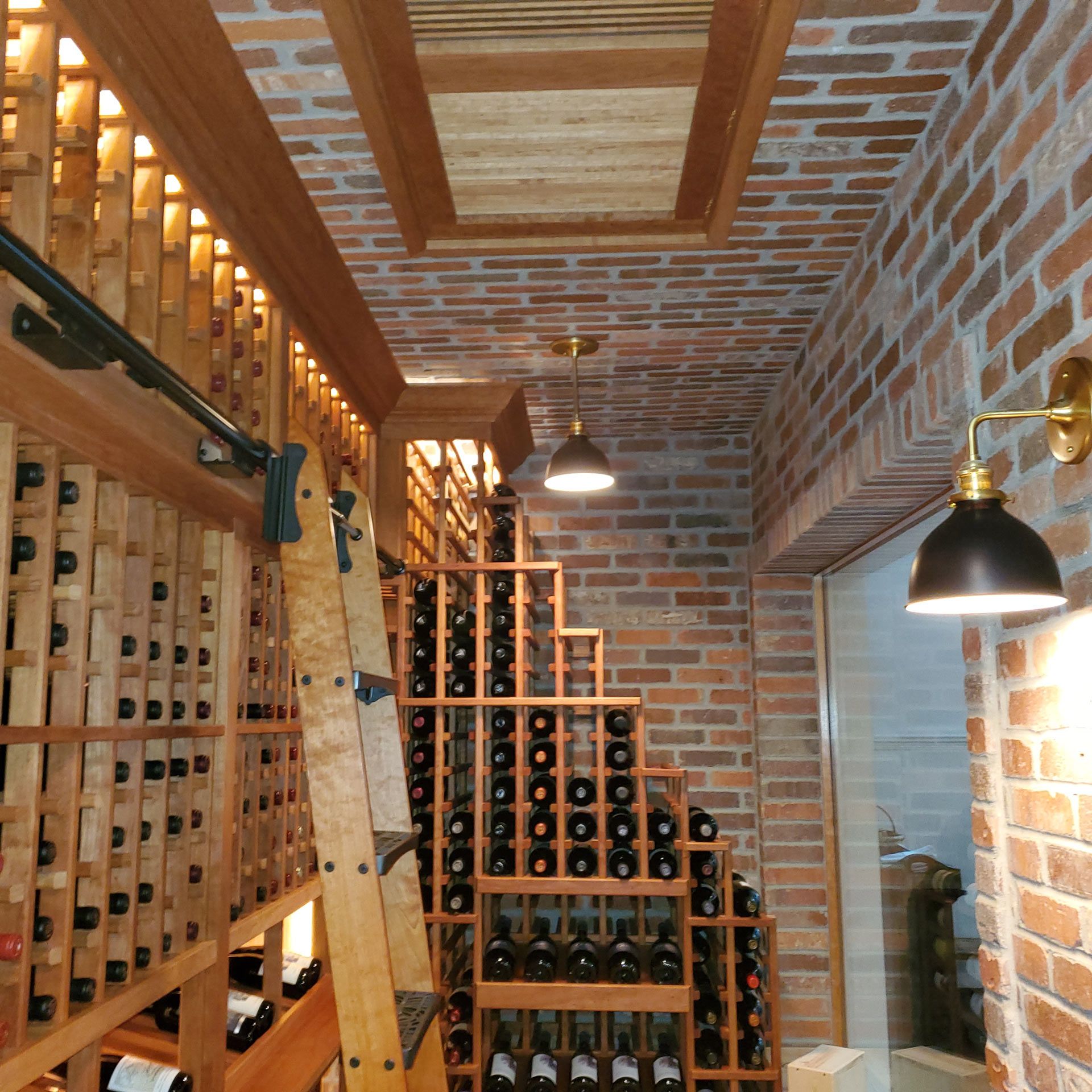 A wine cellar filled with lots of wine bottles — Pinellas County, FL —  R. J. Lange  & Son Inc.