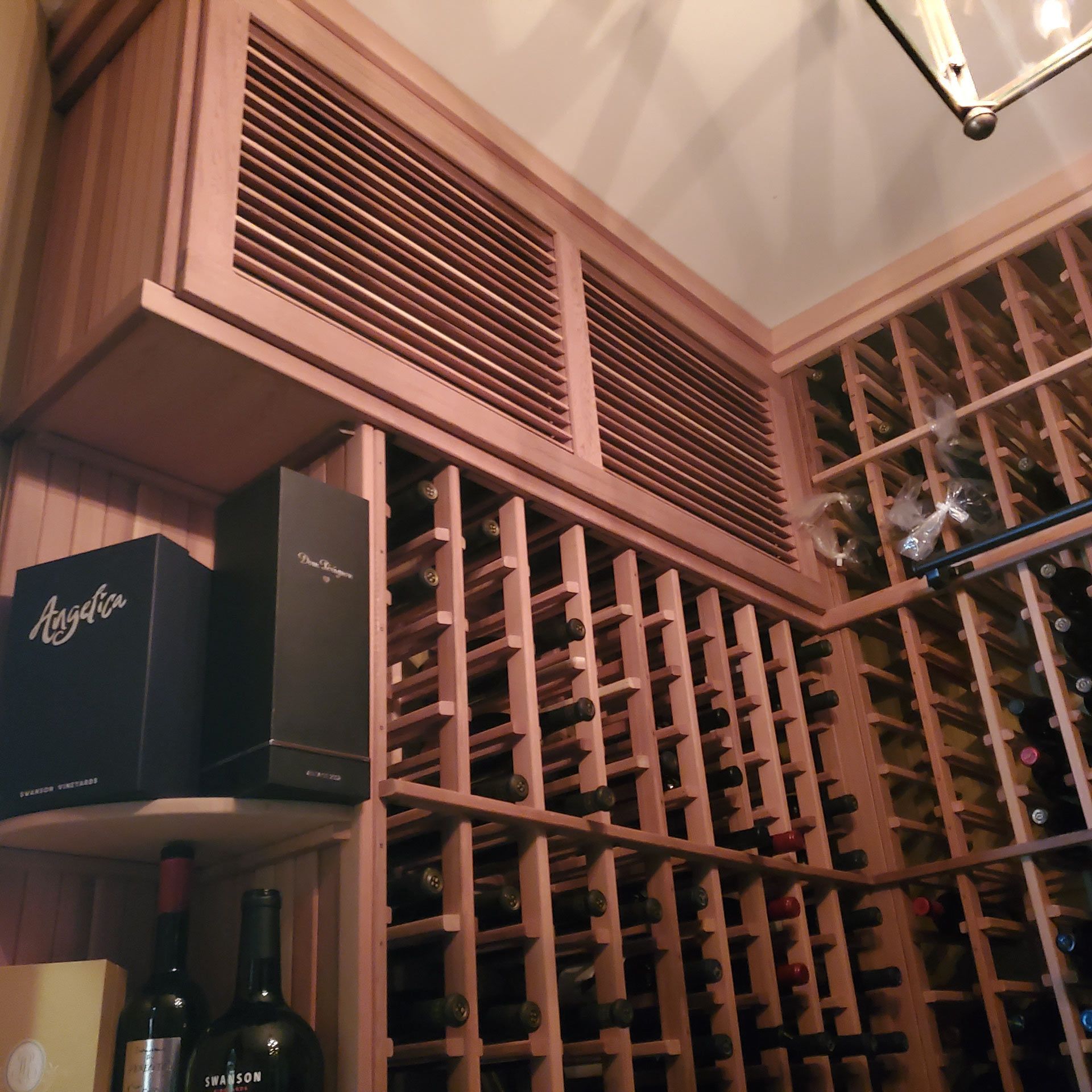 A bottle of agave sits on a shelf in a wine cellar — Pinellas County, FL —  R. J. Lange  & Son Inc.