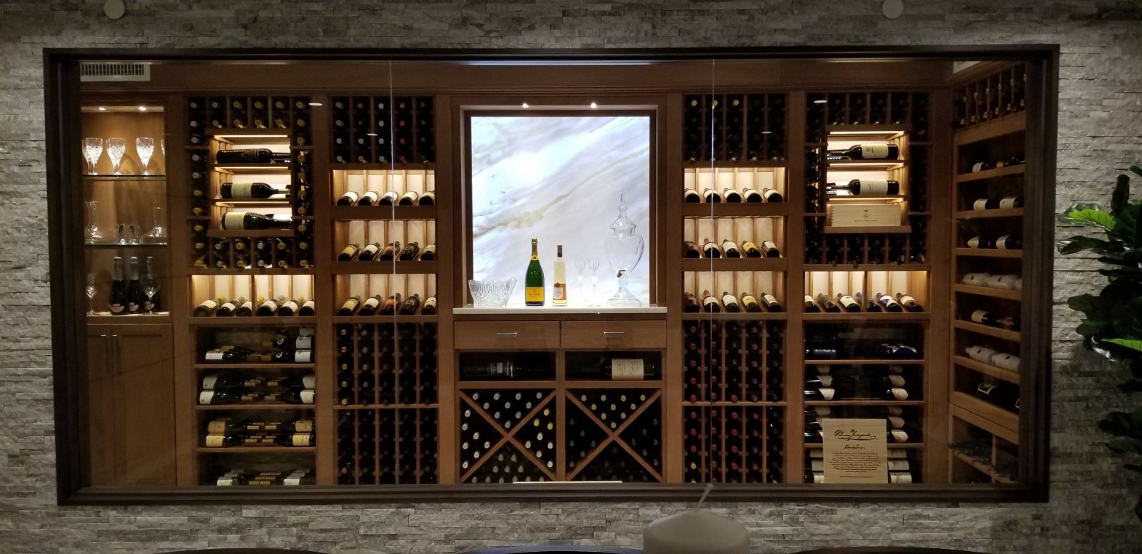 A large wine cellar filled with lots of wine bottles and glasses — Pinellas County, FL —  R. J. Lange  & Son Inc.