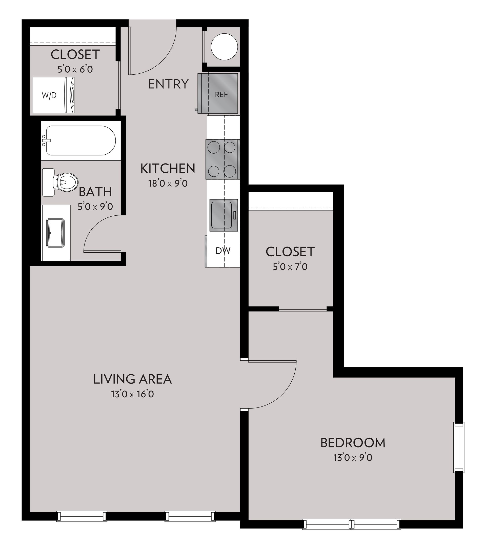 Floor plan of an apartment. It features a living area, bedroom, kitchen, bathroom, and closet spaces.