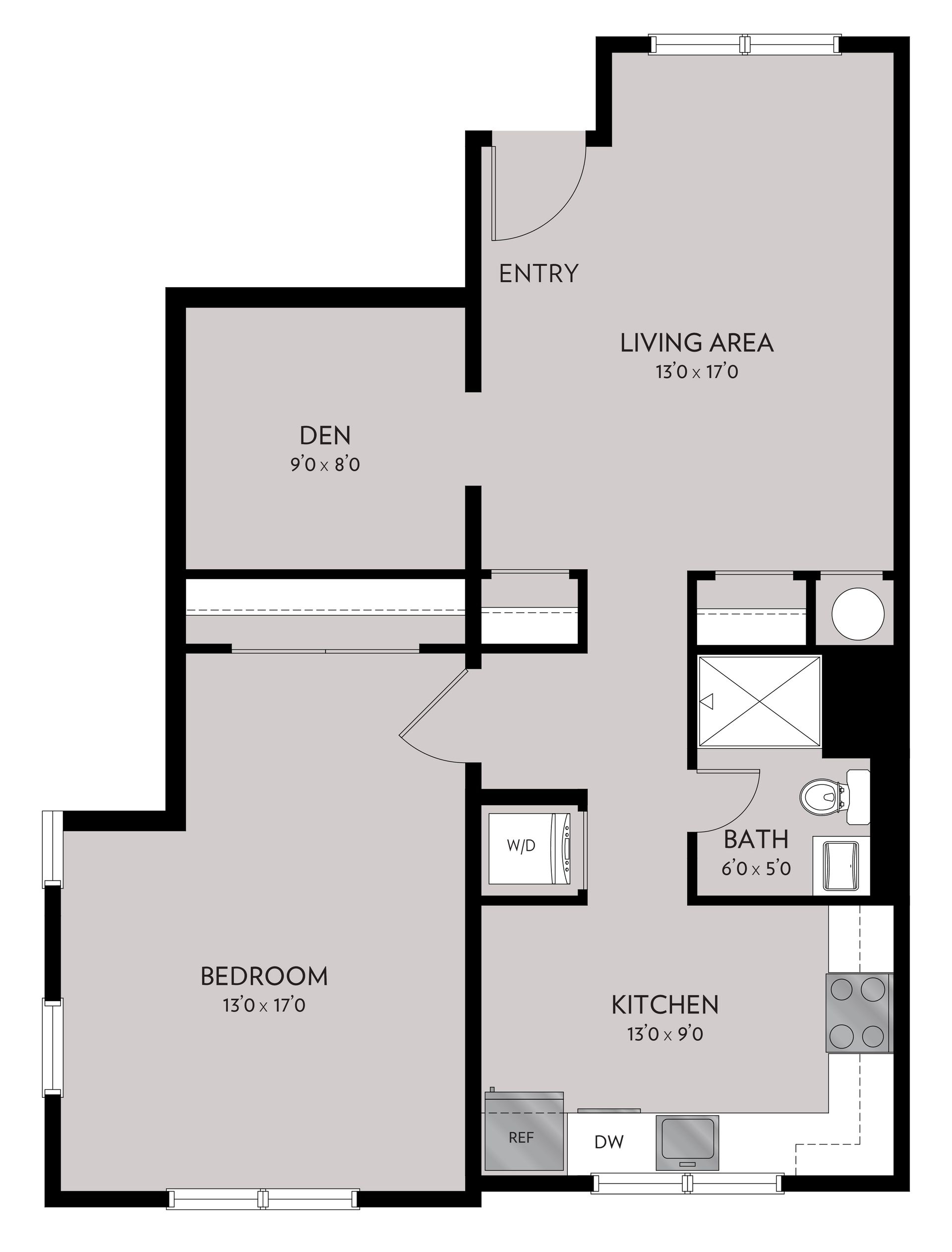 Floor plan of an apartment. Contains a bedroom, living area, kitchen, and two bathrooms.