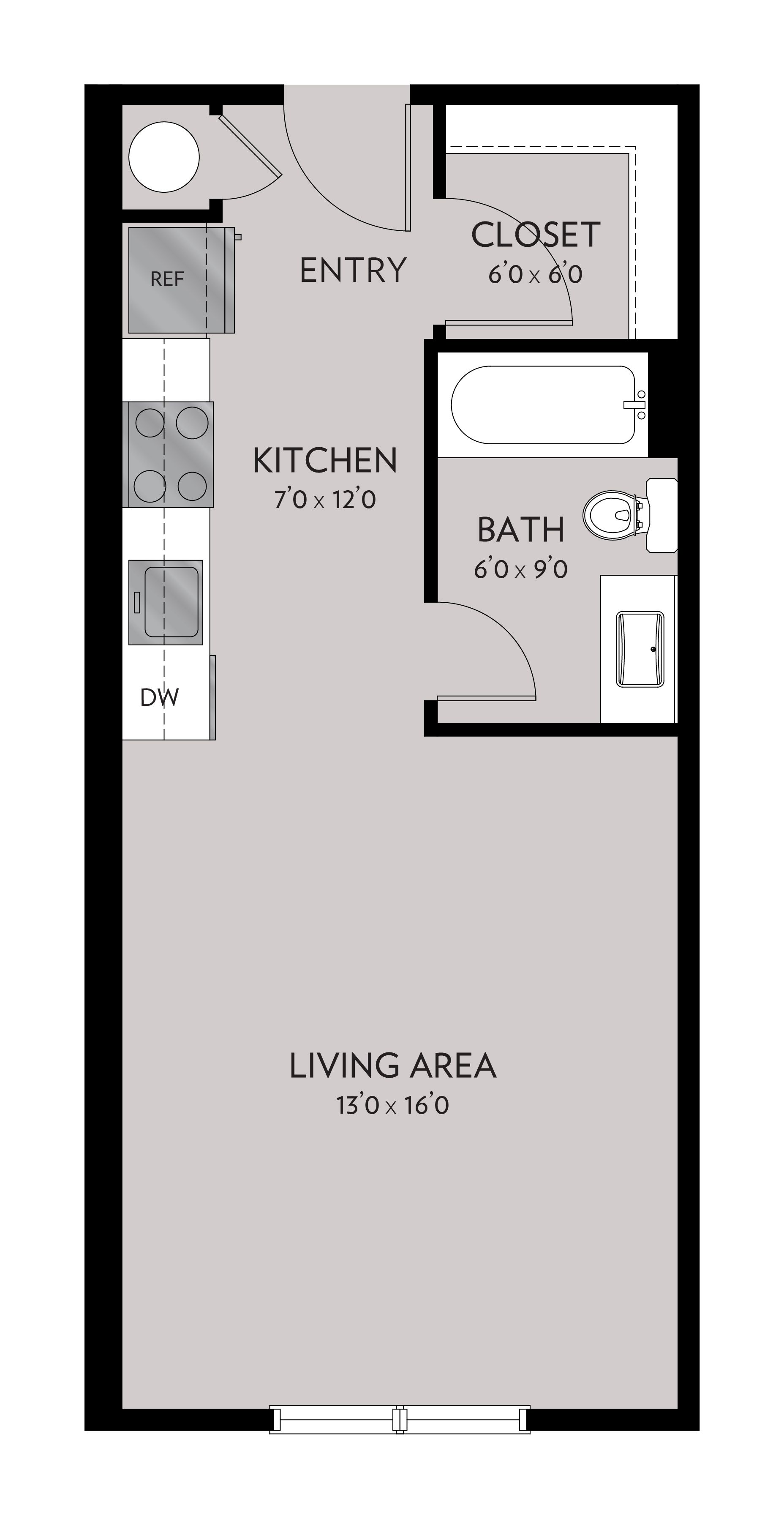 Floor plan of a studio apartment. It includes a kitchen, bathroom, closet, entry, and large living area, with the space labeled.