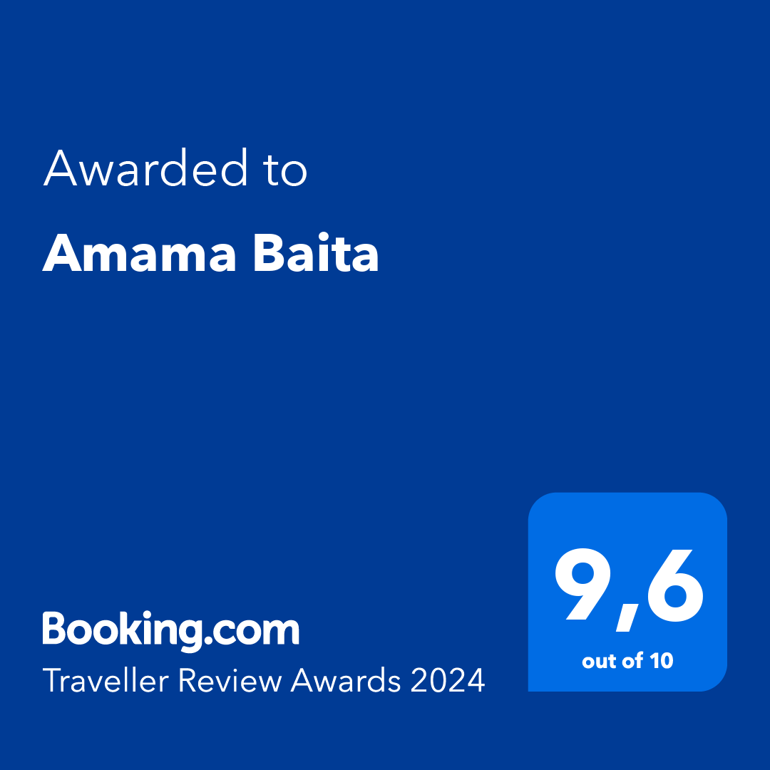 Booking.com award for Amama Baita, with a 9.6/10 score, blue background, 2024 Traveller Review Award.