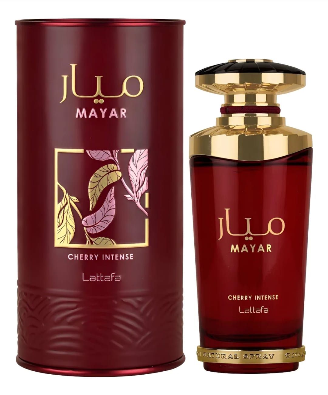 Frasco de perfume rojo “Mayar Cherry Intense” con acentos dorados, en caja cilíndrica roja.