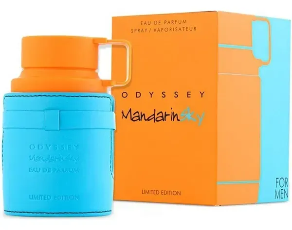 Botella de perfume Odyssey Mandarin Sky con acentos azules y naranjas, con caja a juego.