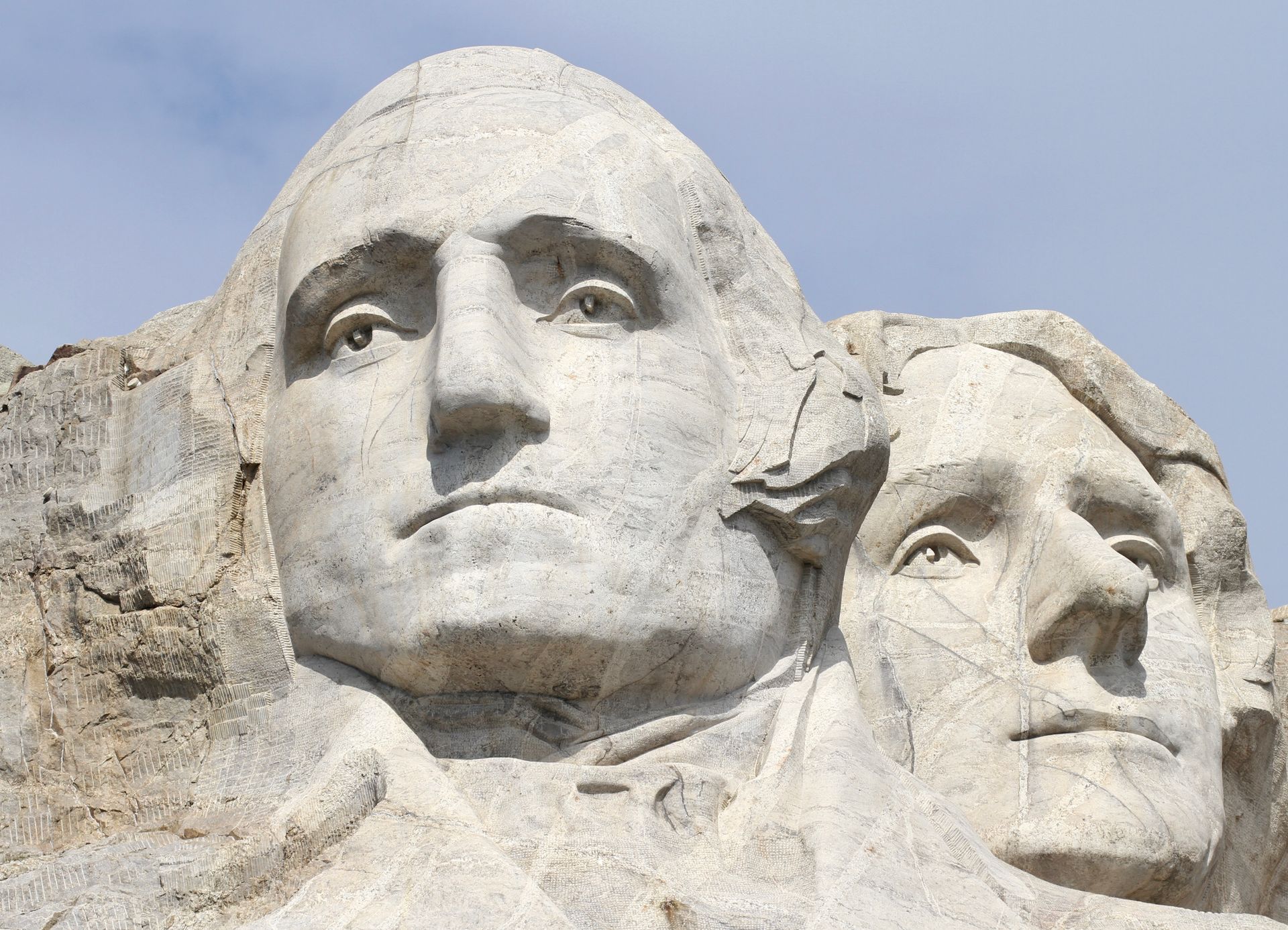 A close up of a statue of george washington and abraham lincoln