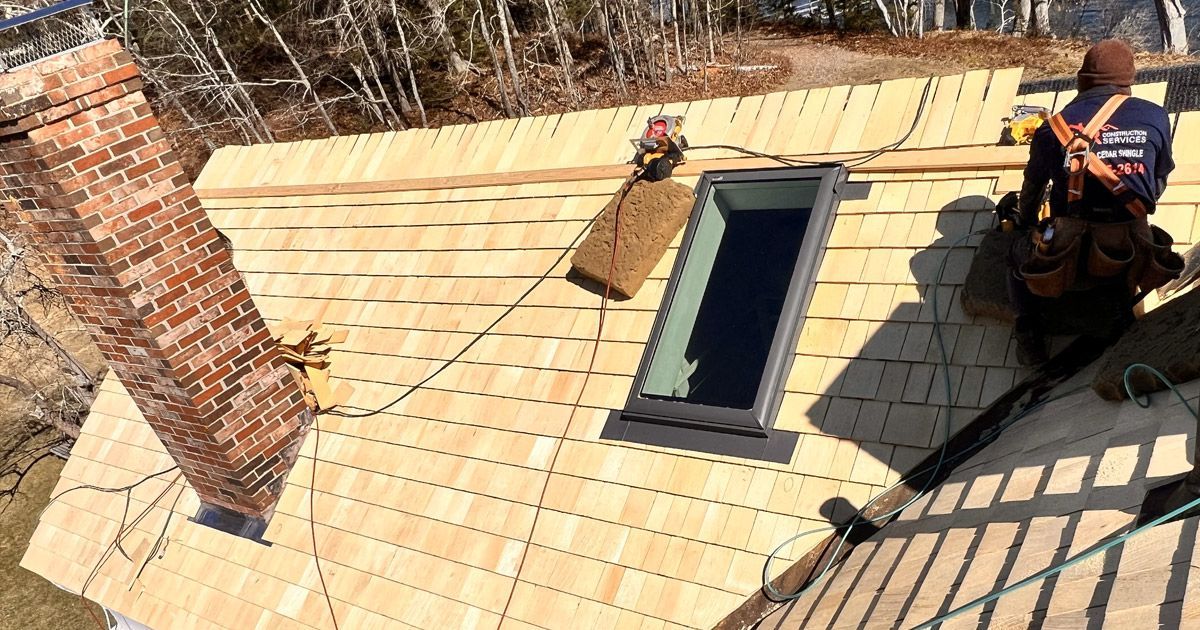 workers installing a roof
