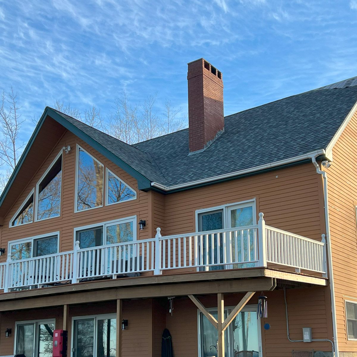 asphalt roof on a brown house