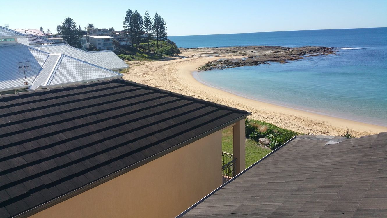 Roof overlooking beach — Skylight Installations & Repairs in Central Coast, NSW