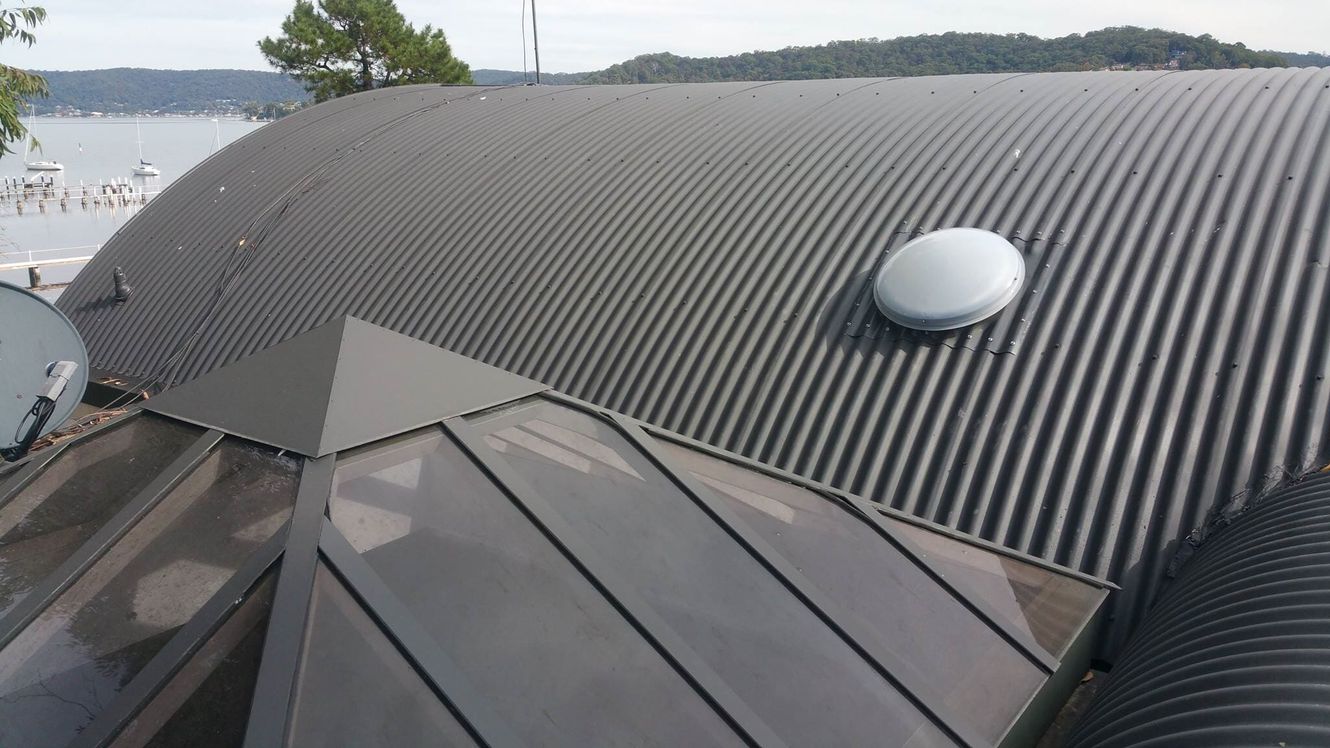 Tubular Skylights on grey roof — Skylight Installations & Repairs in Central Coast, NSW