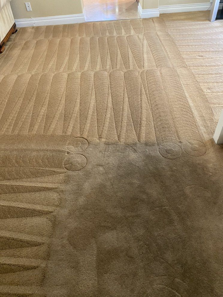 A before and after picture of a carpet being cleaned in a living room.