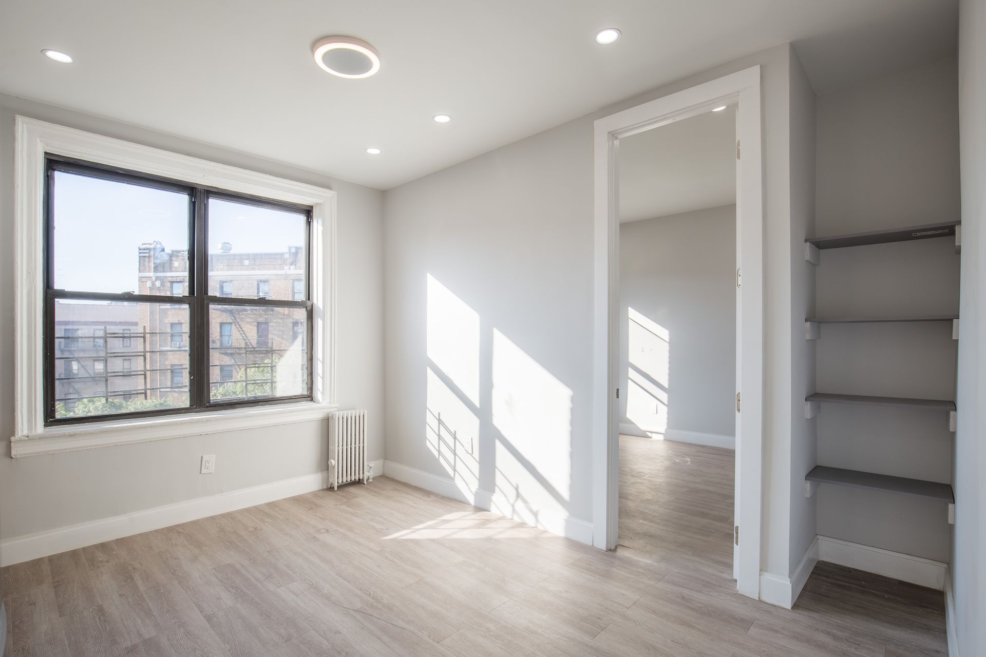 There is a large window in the middle of the room.