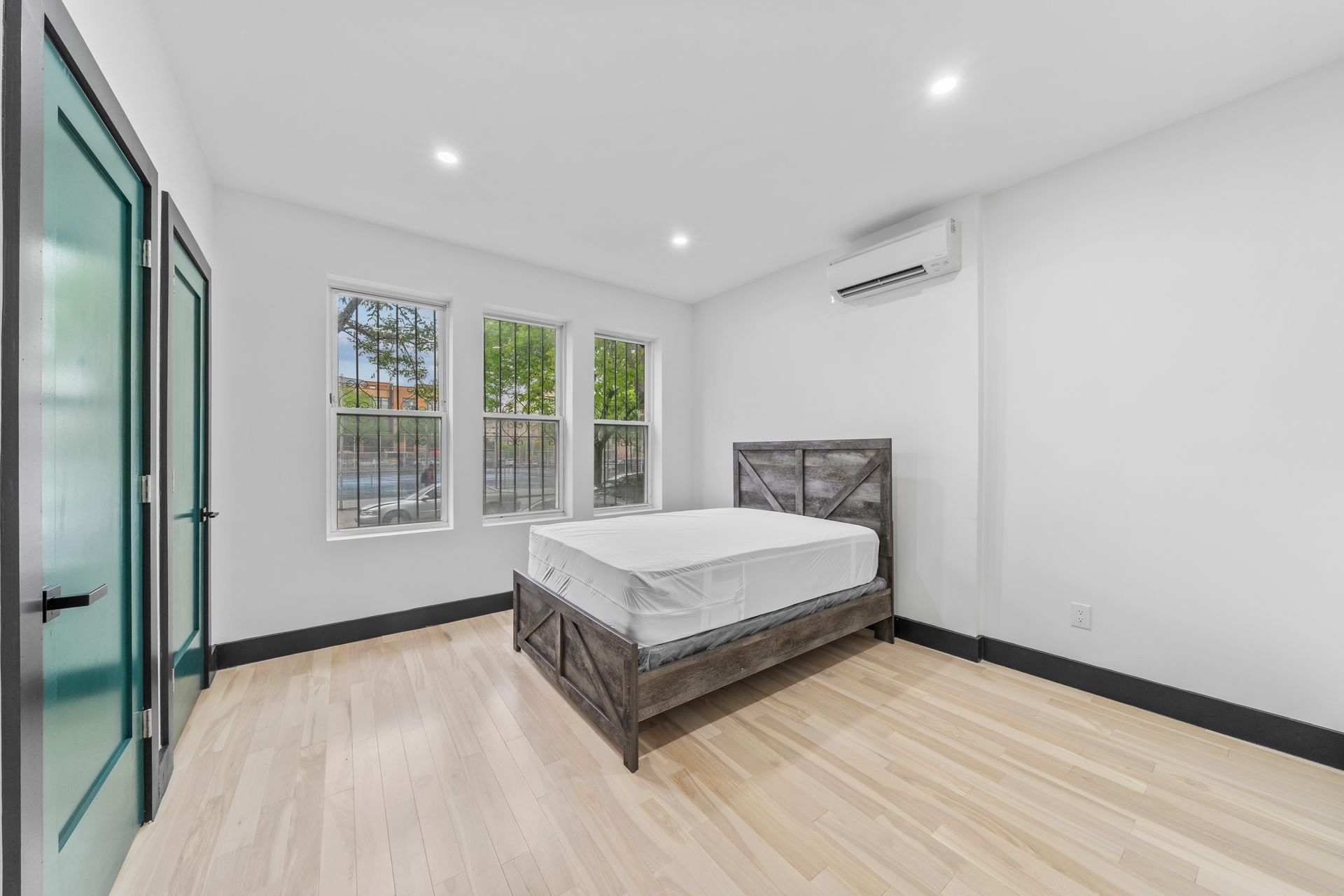 There is a bed in the middle of the room.