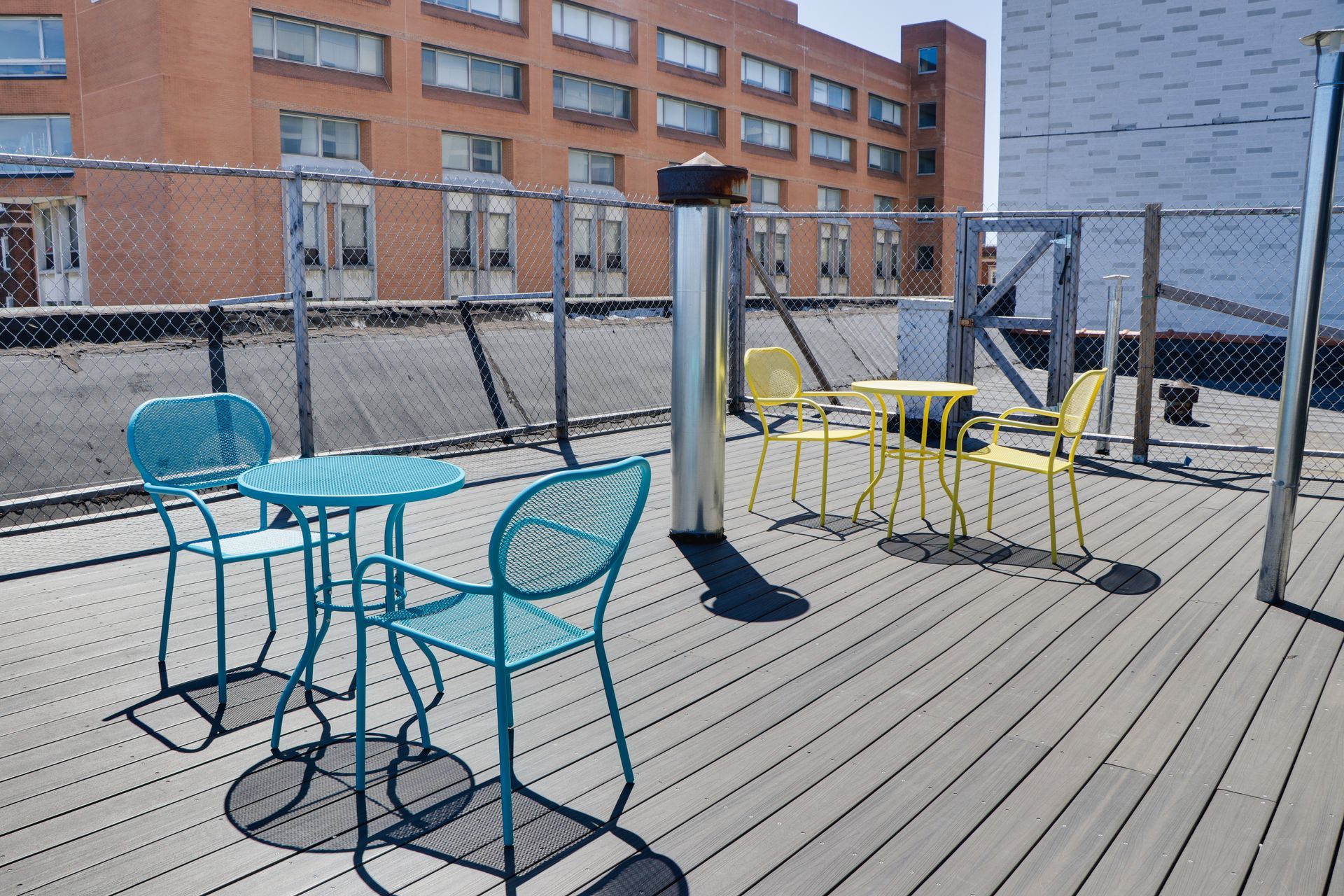 A deck with a table and chairs on it