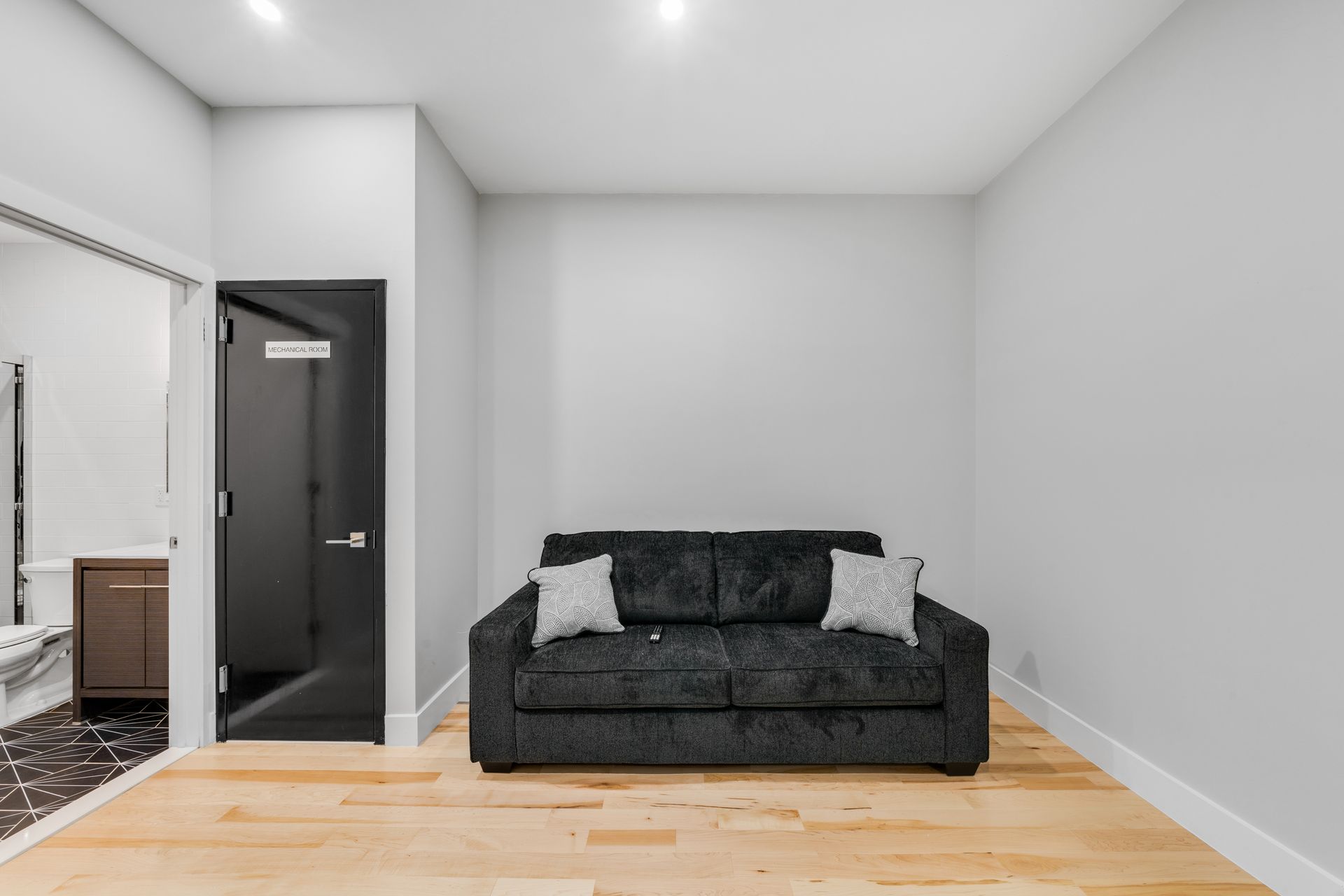 There is a couch in the middle of the room.