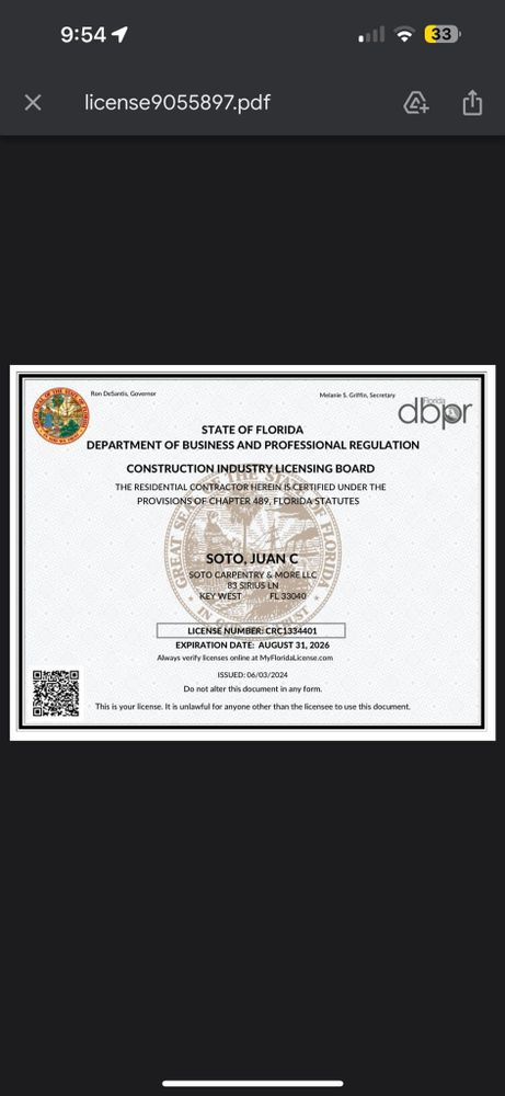 A picture of a certificate on a cell phone.