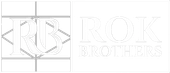 ROK Brothers logo in white and blue text