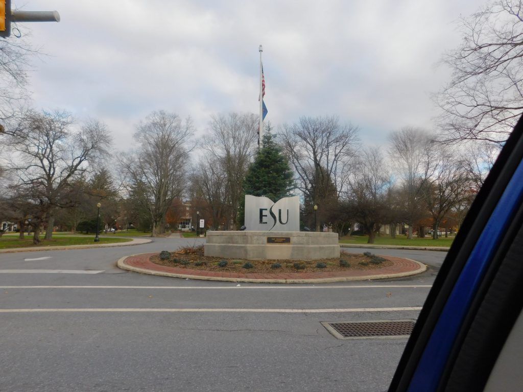 A roundabout with an East Stroudsburg University sign.