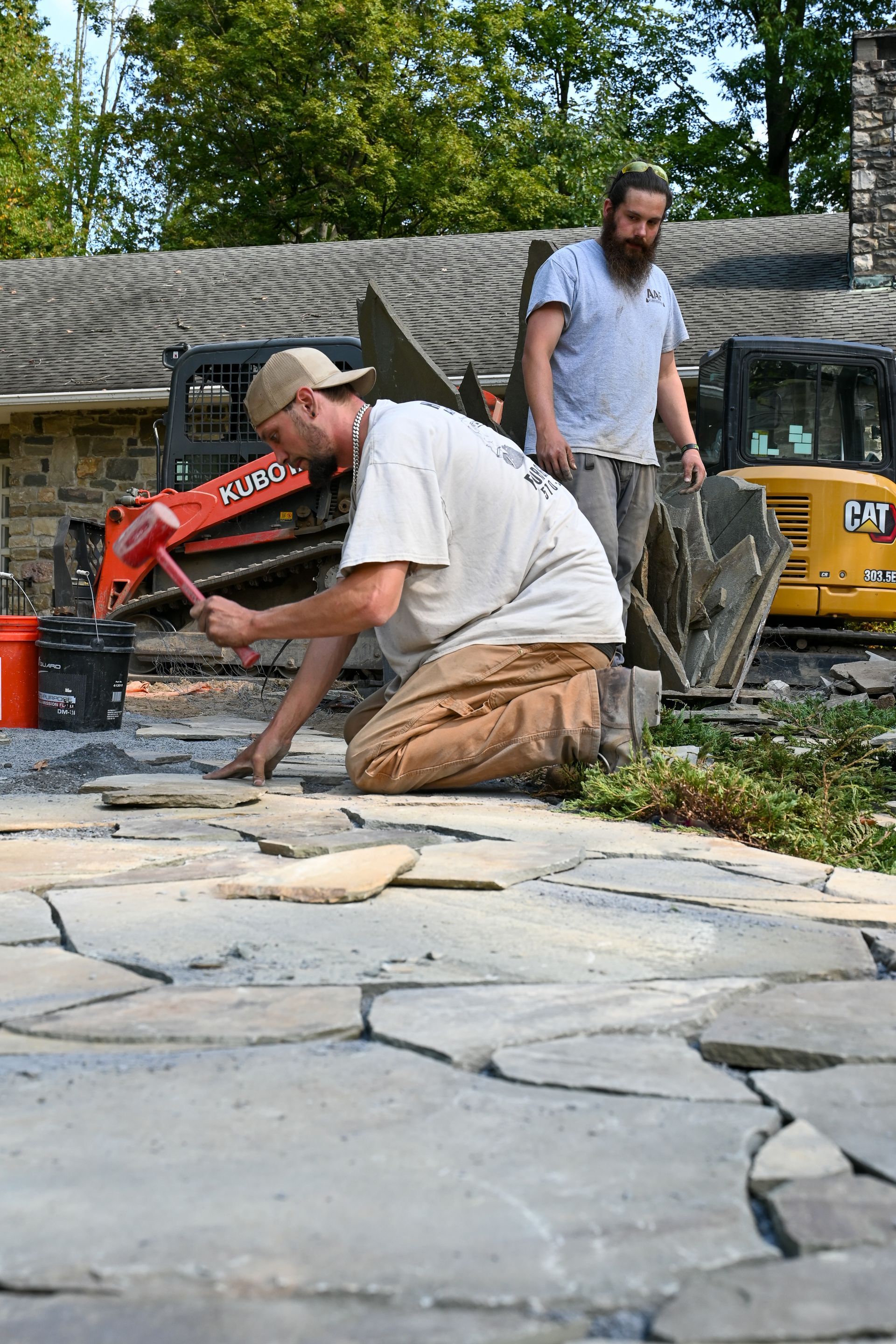 A.A.F Landscapers working on commercial landscaping