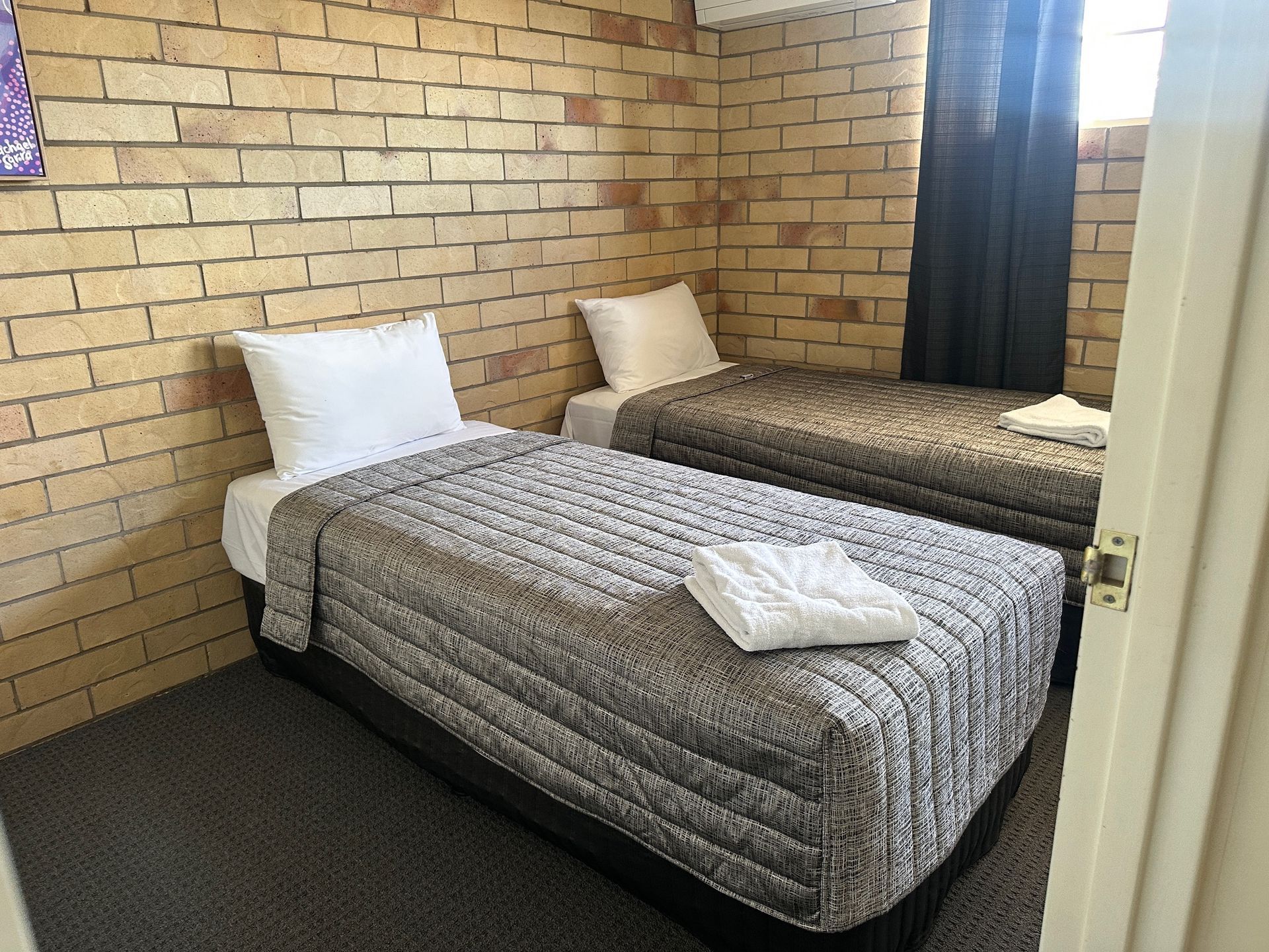 2 Single Beds 2nd bedroom of the 3 bedroom apartment.