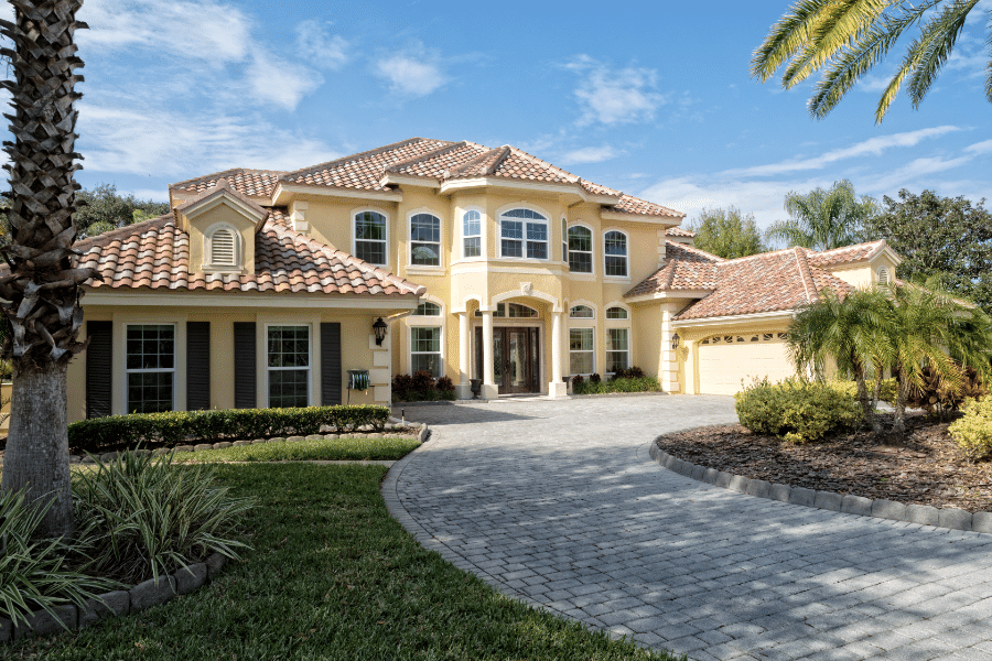Exterior of Estate Home with Paver Driveway