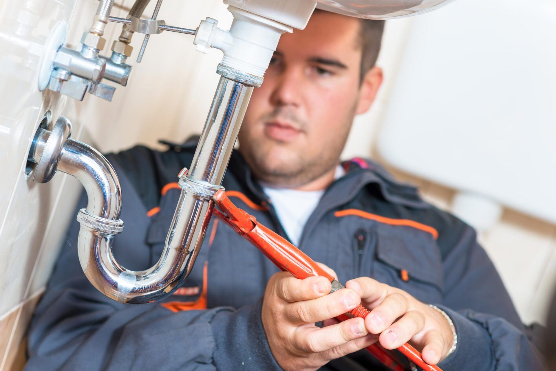 Plumber Repairing Drain – Melbourne, VIC – Catco Plumbing