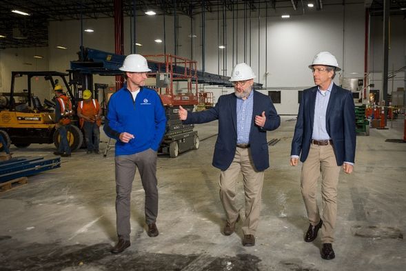 President and CEO Rod Harl, COO Jeff Armstrong and Chief Business Development Officer Ted Goldberg tour the new space in Ohio.