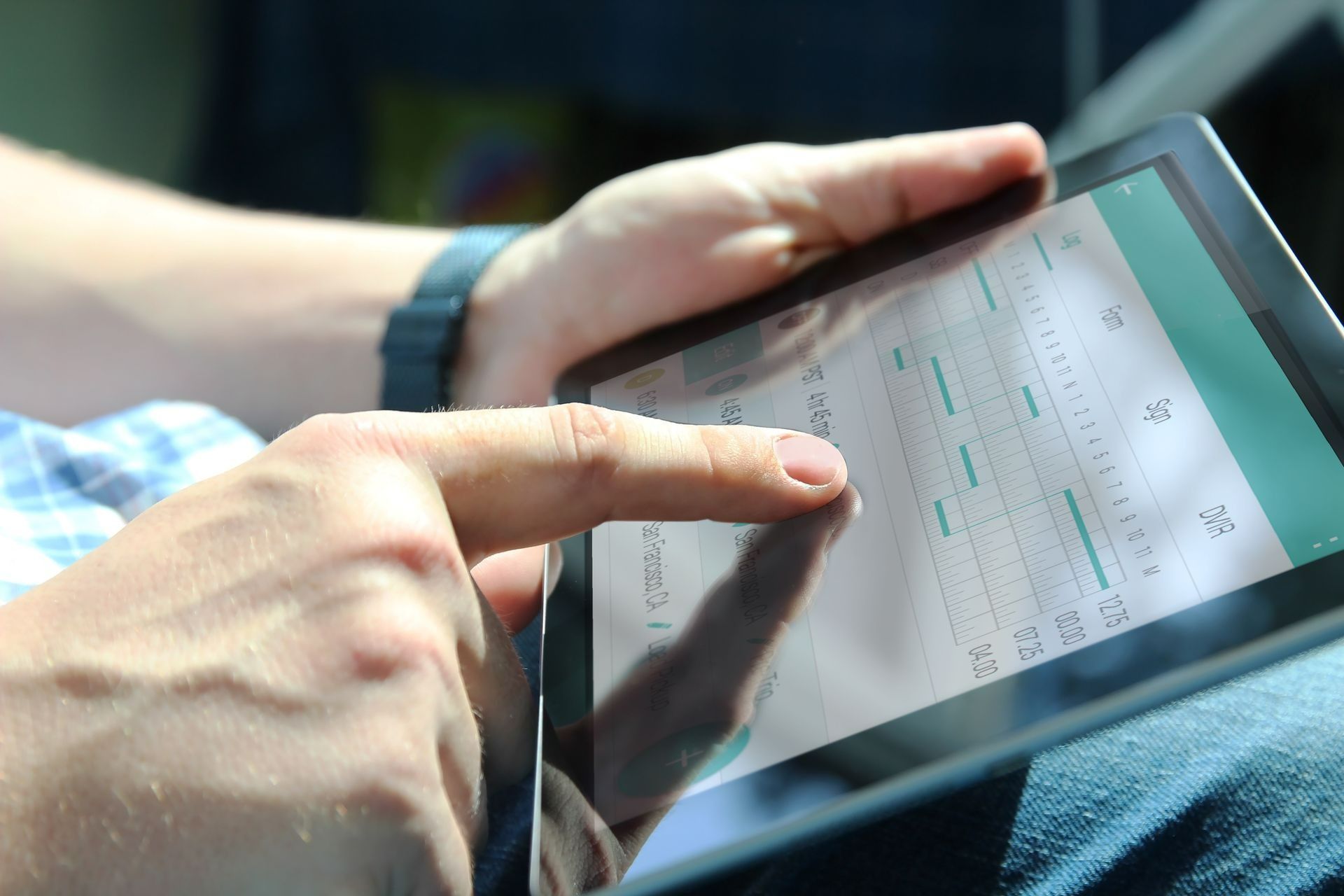 Person Using a Tablet — Barnco Automotive Repairs in Taminda, NSW