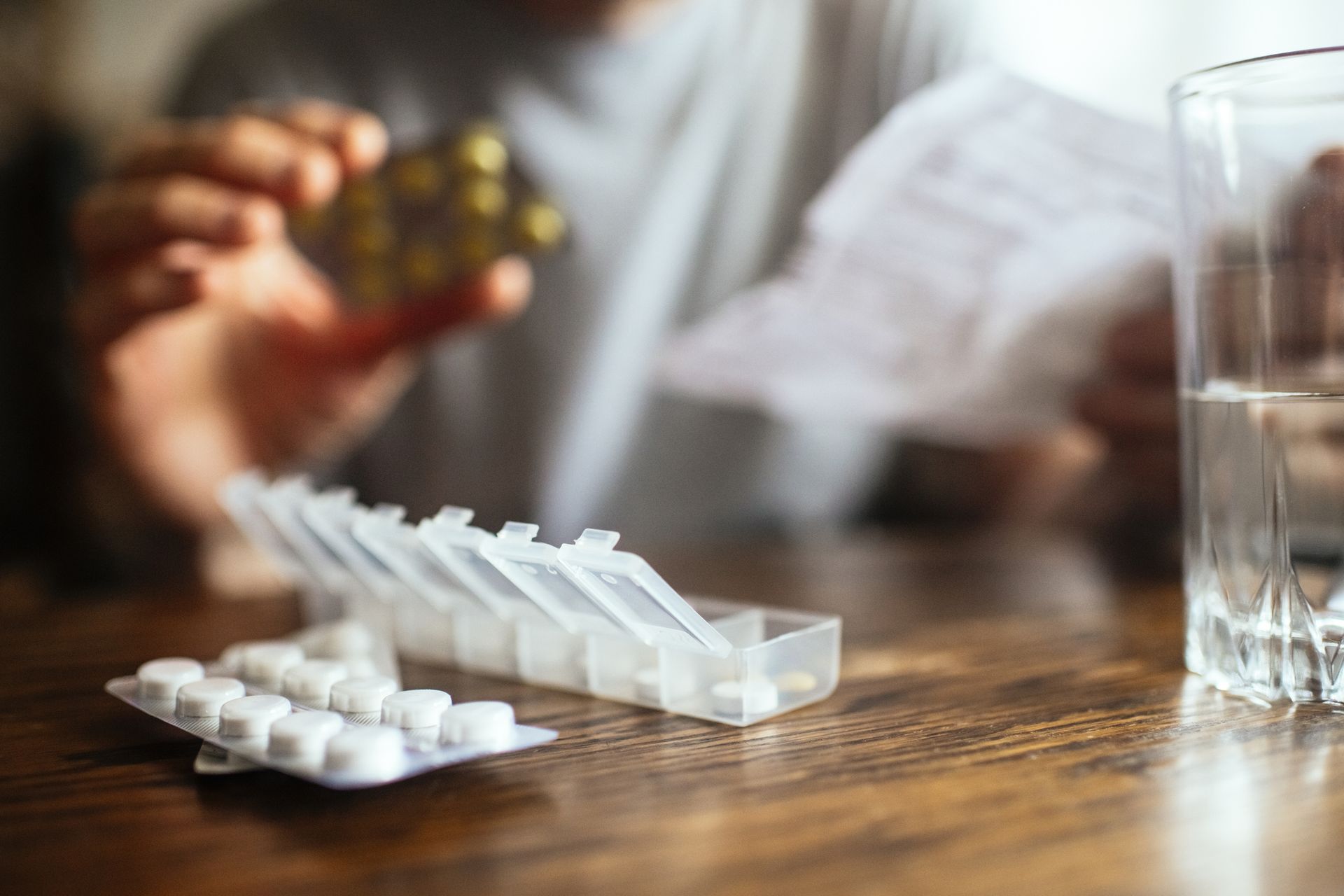 Man with pill organizer.