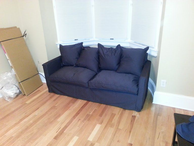 blue quilted couch assembled by furnitureassemblyteam