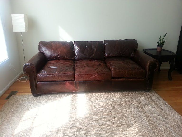 brown leather couch assembled by furnitureassemblyteam