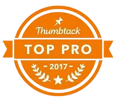 Thumbtack Top Pro award badge, orange and white, with text and laurel wreath, 2017.