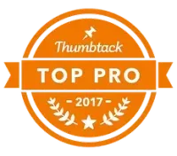 Thumbtack Top Pro award badge, orange and white, with text and laurel wreath, 2017.