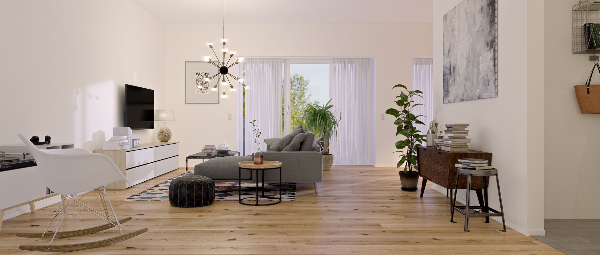 A light-filled living room with hardwood floors, modern furniture, and a view of plants through sheer curtains.