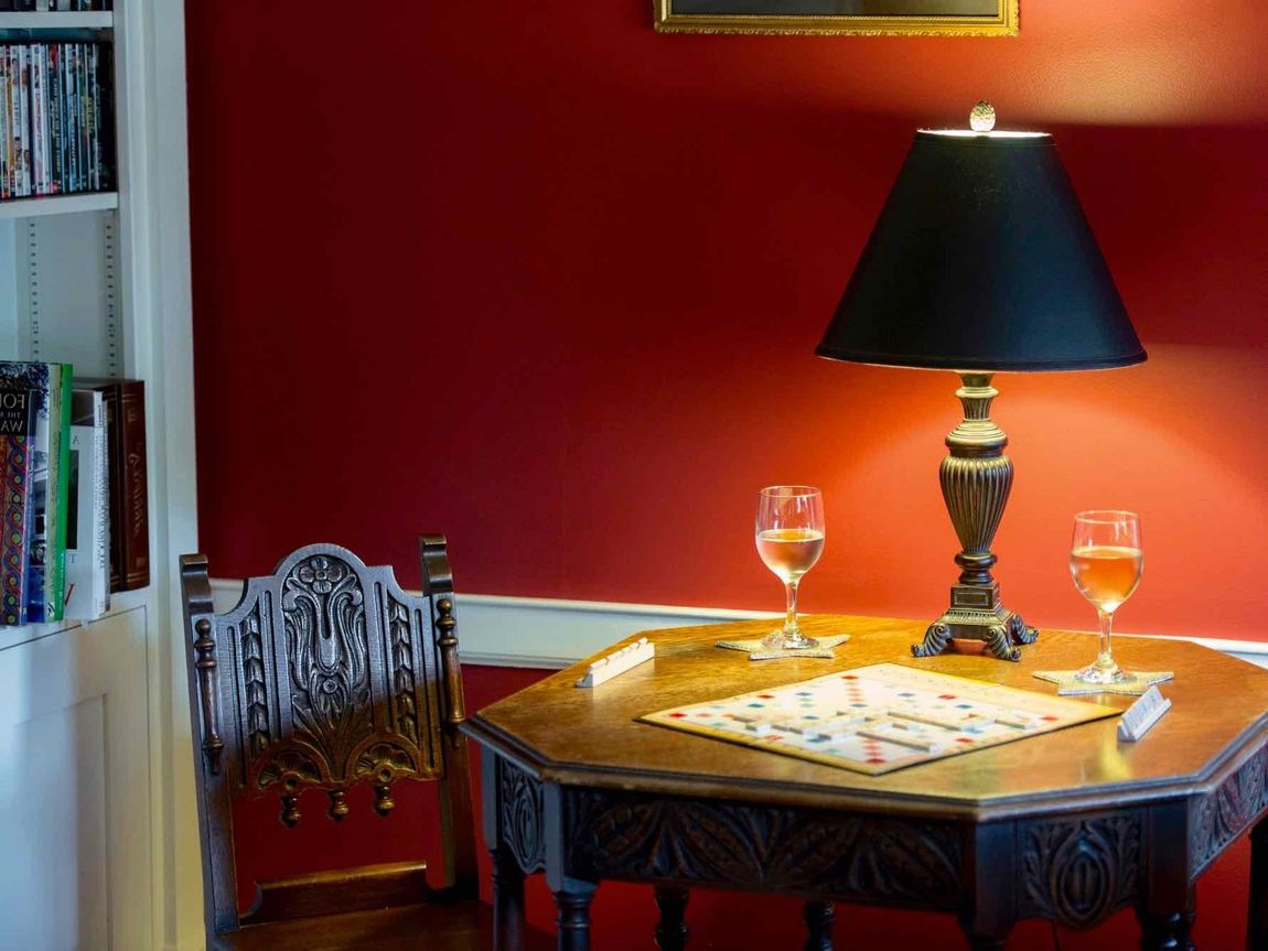 Parlor and game table at Coach Stop Inn